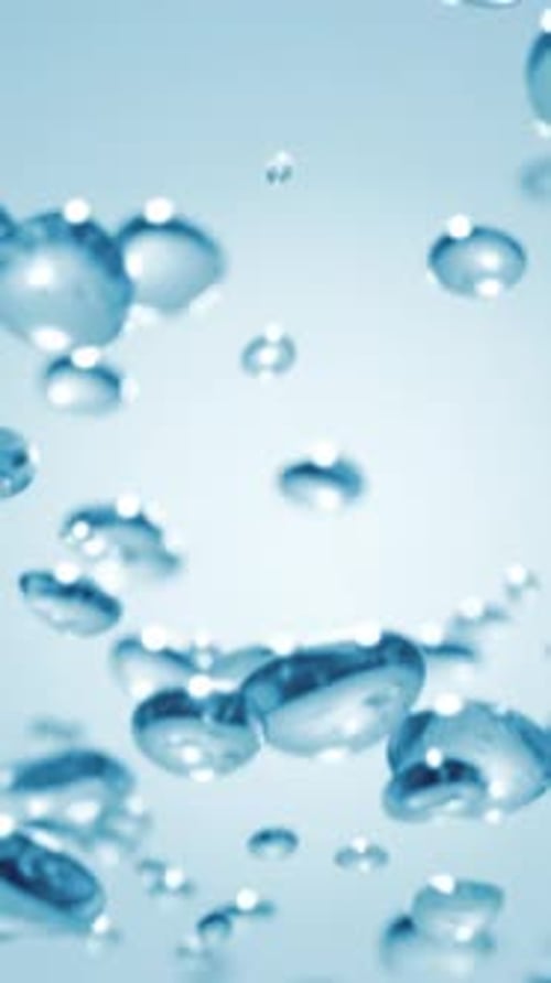 Floating Blue Serum Liquid Bubbles or Water Droplets in Liquid Hydration and Freshness for Skincare