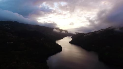 Aerial View Sunset Over the River Mountain Lake