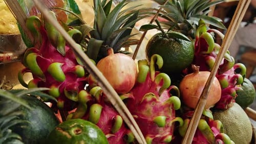 Colorful display of exotic fruits at local market in vibrant atmosphere