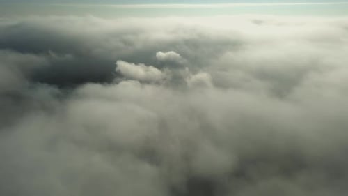 Flight Above the Clouds Towards the Sun Misty Weather View From Above Birds Point of View Aerial