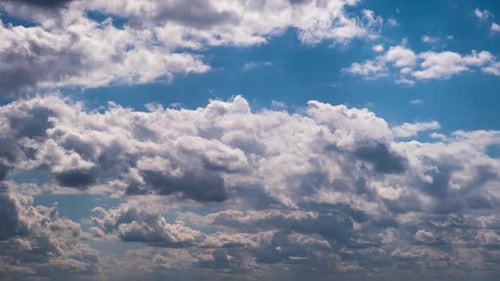 Timelapse of Cumulus Clouds Moving in the Blue Sky