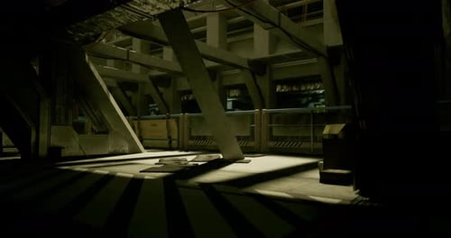 Empty Industrial Space Illuminated By Dramatic Shadows in Evening Light
