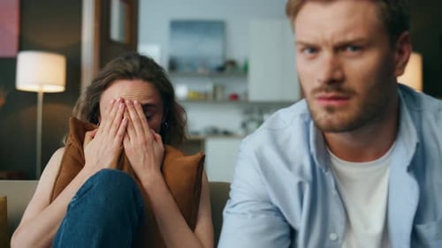 Afraid Couple Watching Thriller Movie Pov