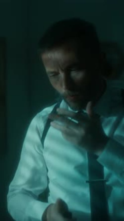 Pensive Detective Smoking Cigarette at Night