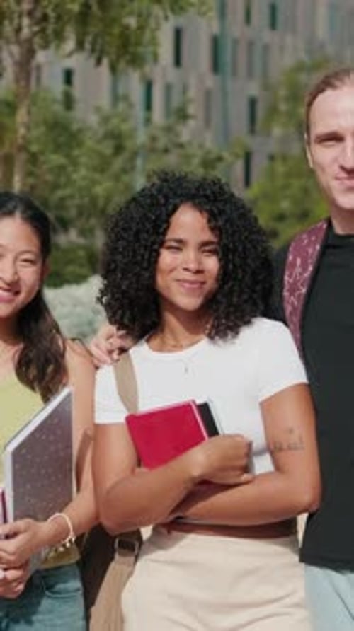 Smiling Students Posing on a University Campus