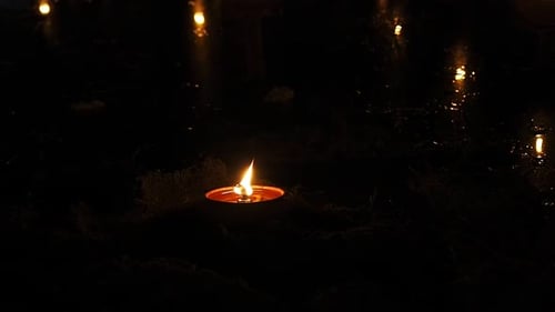 Candles light at night in Loy Krathong Festival in Chiang Mai Thailand.
