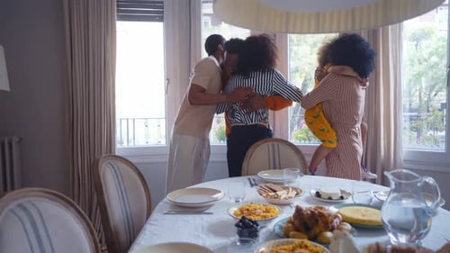 family reunited at parents house for lunch during the holidays.