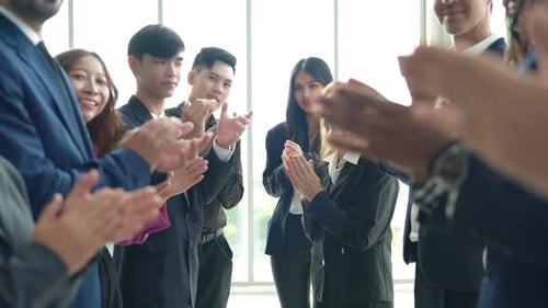 Diverse Team of Professionals Clapping in Office