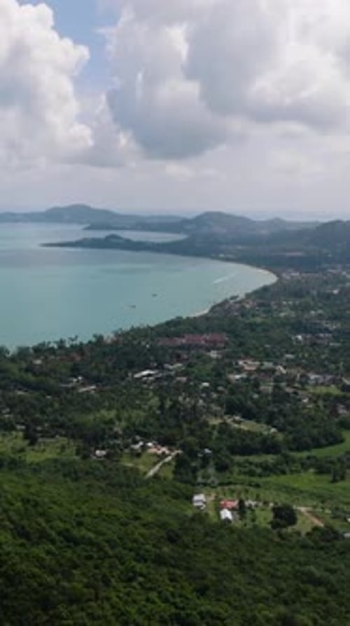 Coastal Landscape with Lush Green Hills and Turquoise Water Maenam Ko Samui Thailand