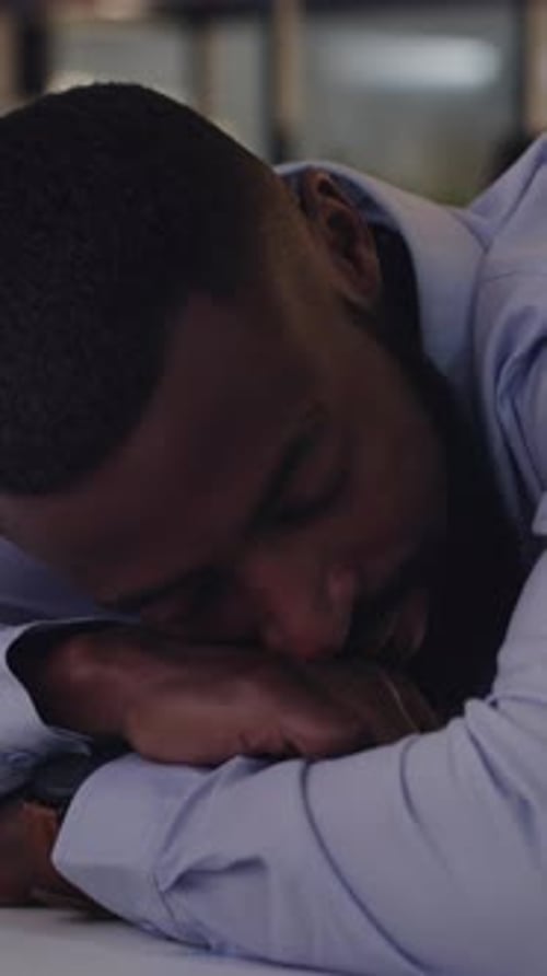 Night, tired and sleeping with business black man in office for fatigue