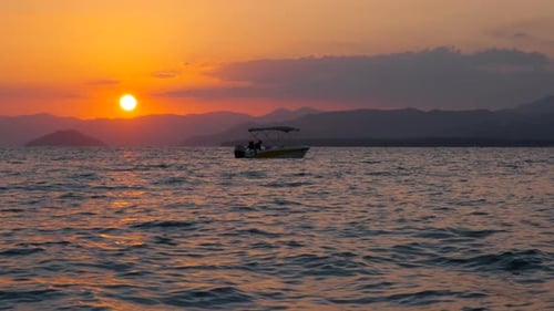 Tranquil Sunset Boat Ride on the Ocean