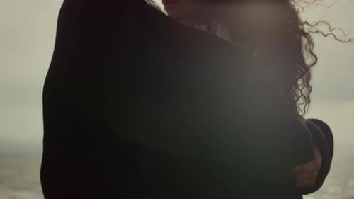 Couple Embracing Sea Beach. Relaxed Ethnic People Enjoying Sunny Day Together Outdoors. Calm Roma...