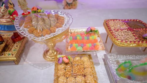 Colorful Indian Wedding Stage Decoration with Traditional Dolls Flowers and Ceremonial Setup Close