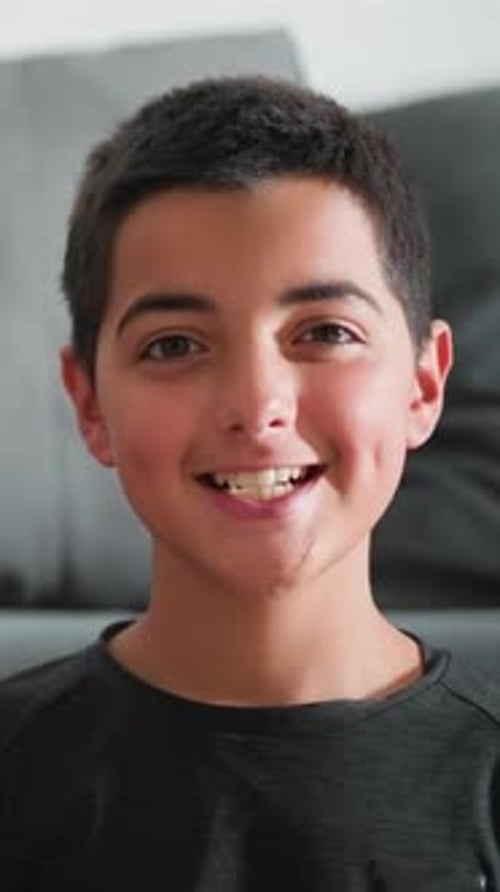 Boy and Girl Smiling in a Close Up Portrait