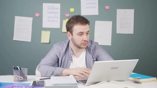 Young Adult Talking on Laptop Video Call