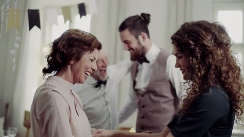 People at Event Embrace and Celebrate Together Indoors