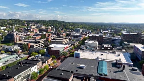 Wide Aerial Establishing Shot of a Small City During Daytime