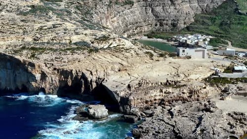 Breathtaking wide angle view of Dwejra Bay Inland Sea in Gozo Malta during a bright summer day