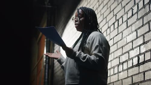 Black Female Standup Comedian Making Performance at Amateur Theater
