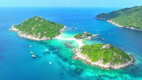 Drone aerial view captures stunning island. 4K.