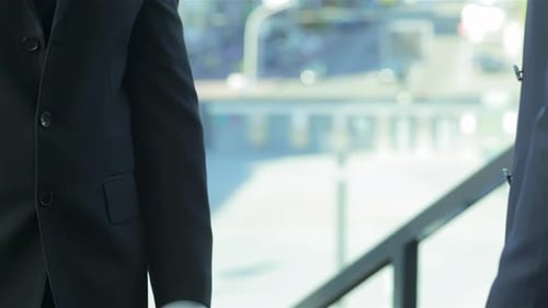 Close up of Businessmen Shaking Hands