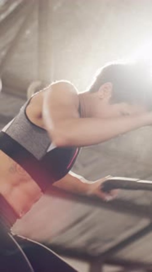 Stationary bike, fitness and health with woman in gym for cardio challenge