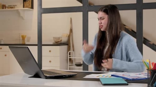Woman Using Sign Language on Laptop Video Call