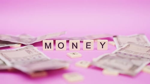 Letter Blocks Spelling Money with Rupee Notes