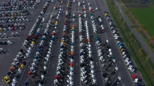 Aerial view of trucks parked in rows, Belgium.
