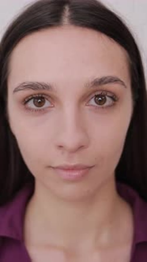 Young Woman Smiling at the Camera Close Up