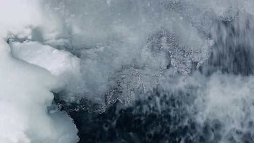 Ice Crystals in Winter. Closeup. Ice Background. Icicles with Water Drops. Close