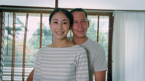 Asian family, Smiling, close-up portrait, loving hug. Happy home