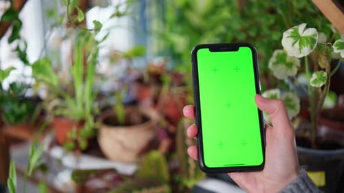 Woman Using Mobile Shopping Online Store for Gardening