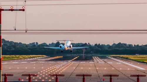 Breathtaking And Beautiful View Of Airplane Landing On Runway