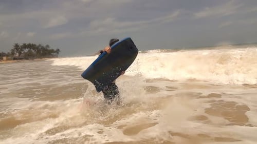 Teenage Boy Surfing on Board in Sea, Super 240