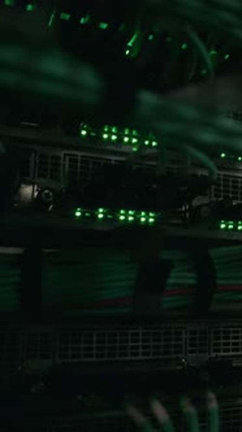 Server Room Racks and Vibrant Cables at Night