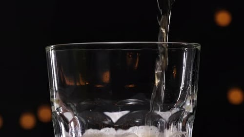 Craft Beer Pouring Into Glass, Close Up