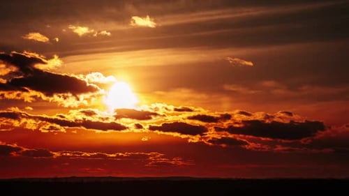 Majestic Sunset Time-Lapse with Golden Clouds