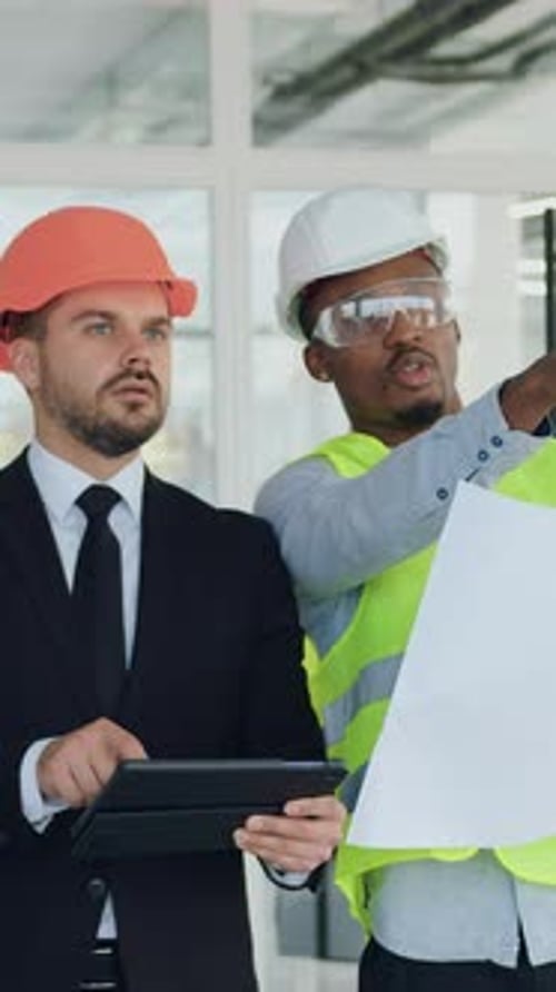 Attractive Successful Smart Bearded Ceo of Building Company Inspecting New Built Office Building