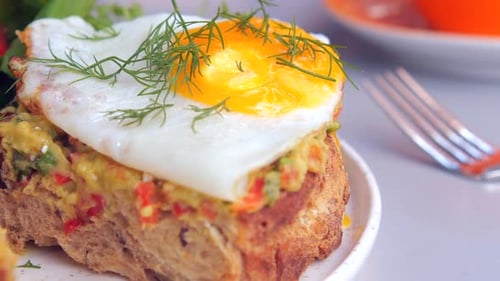 Toast Topped with Fried Egg and Avocado