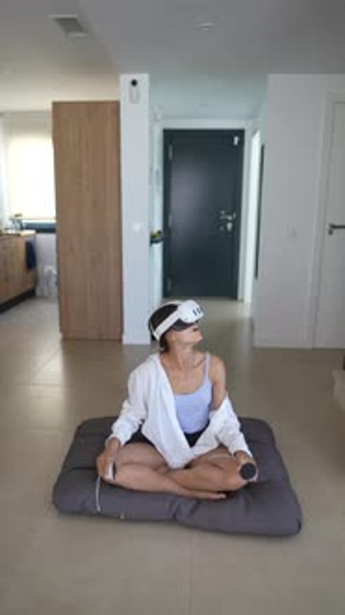 Woman Using VR Headset in Modern Home