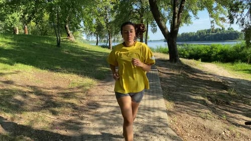 Jogging along the scenic view of a public park