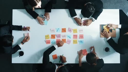 Top view of business team use sticky notes brainstorming idea. Directorate.