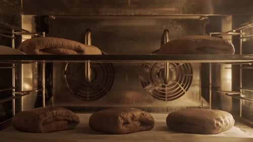 Time Lapse Baking Loafs of Bread in Bakery Oven with High Temperature Close Up