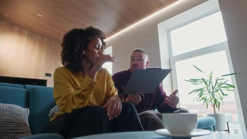 Businesswoman Signing Contract Meeting with Male Partner in Office Space