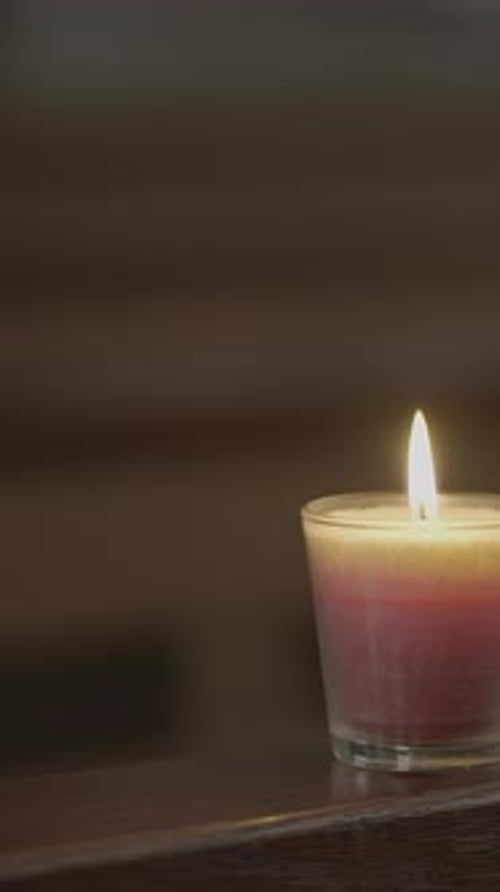 Enjoy the Warm Candle Light Shimmering in an Elegant Glass Holder Ideal for Any Setting