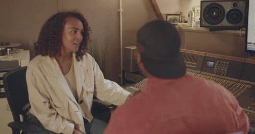 Producer and Singer Composing in Recording Music Studio