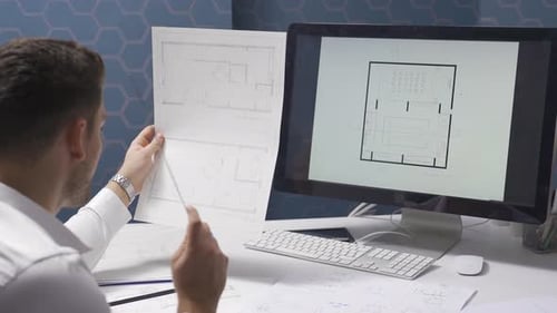 Male designer working in modern office for a new project. Interior architecture.