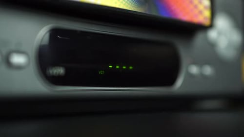 Loading VHS Cassette Tape and Play on Info Screen, Close Up