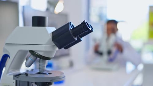 Microscope in a Brightly Lit Medical Research Lab
